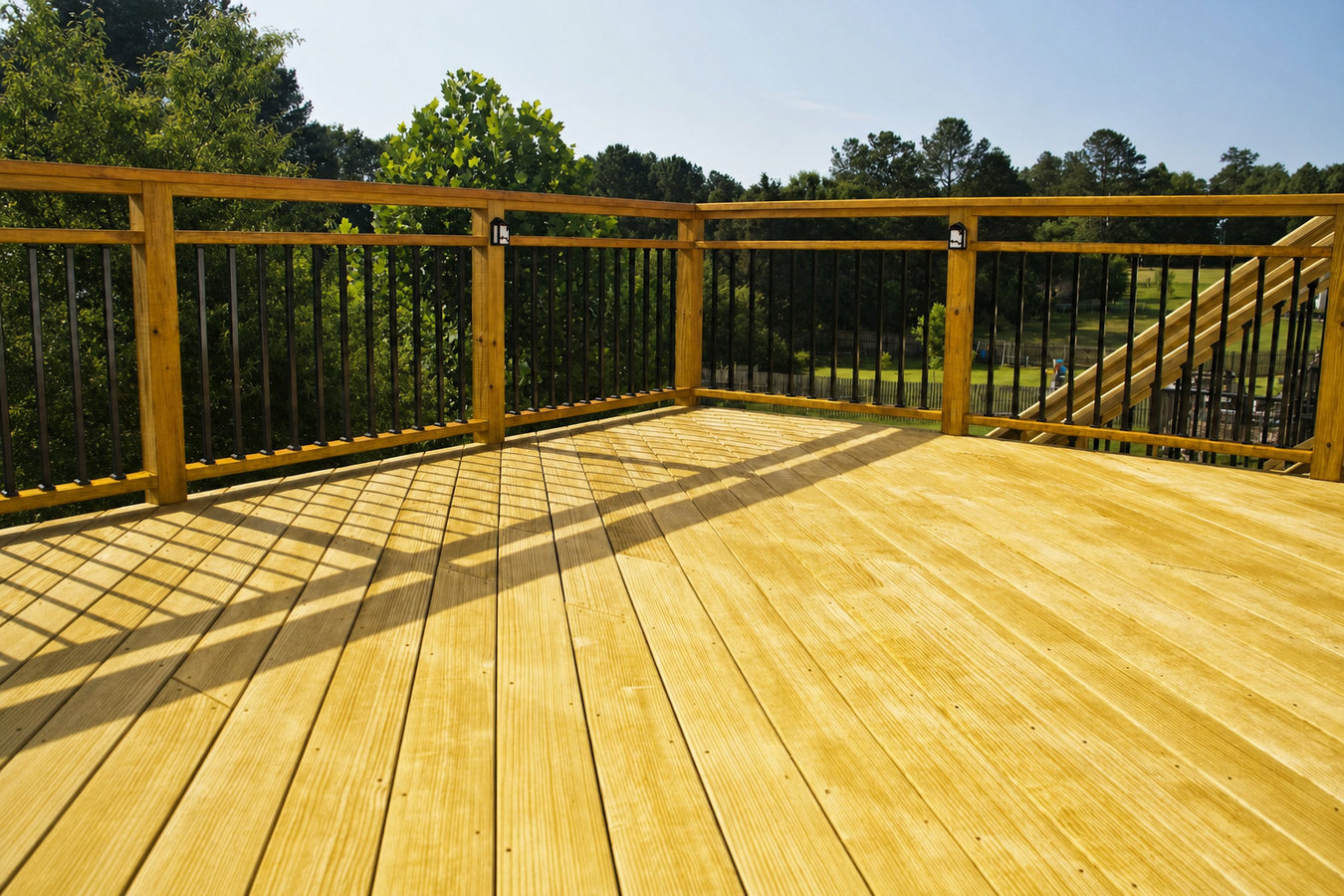 Pressure-treated wood deck construction